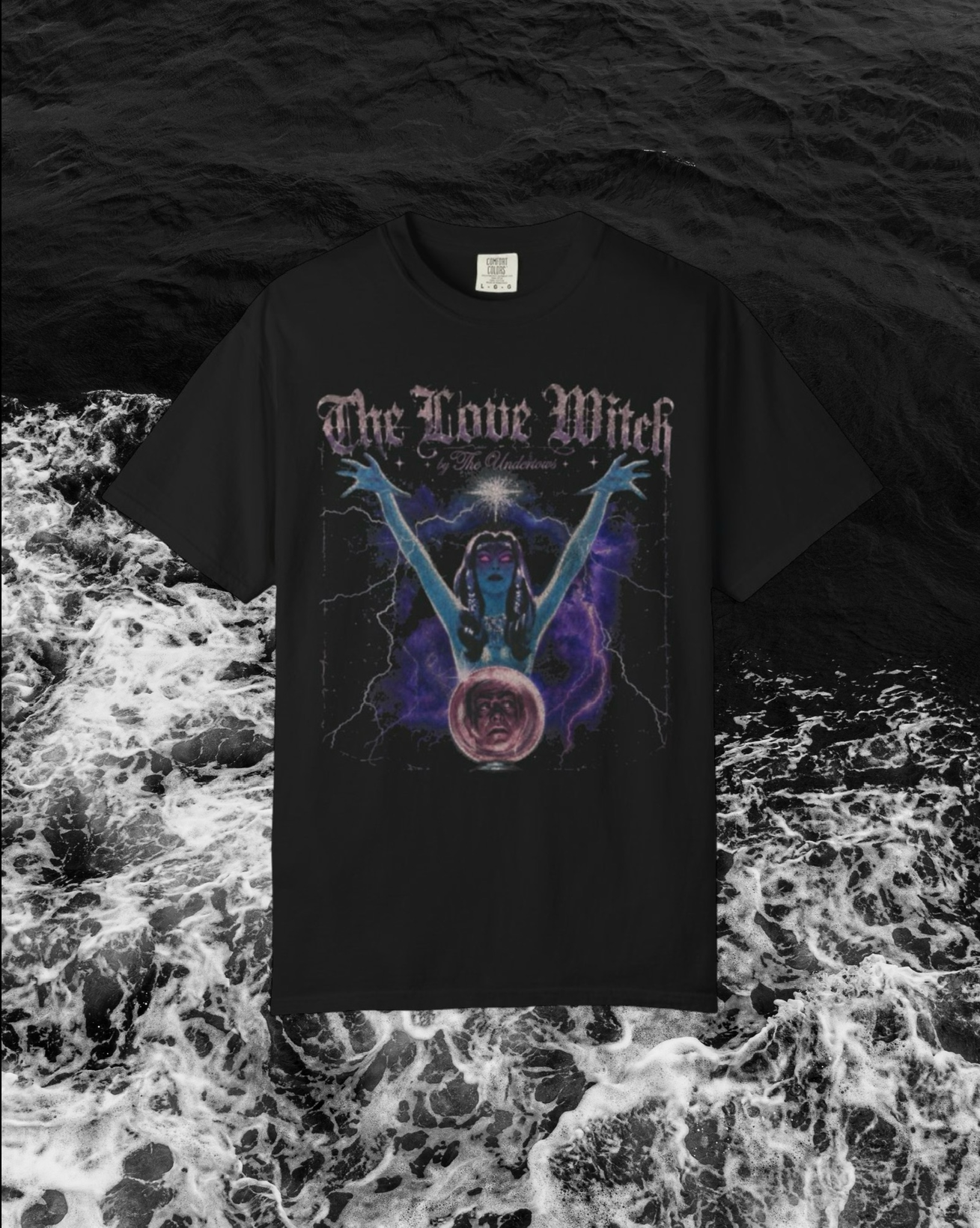 Black t-shirt with 'The Love Witch' signature design on a dark background